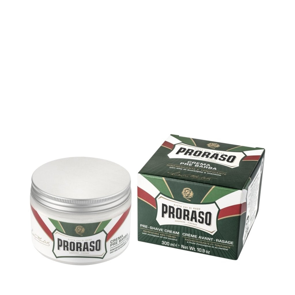Proraso pre-shave crème van 300 ml in witte pot, naast de groene doos